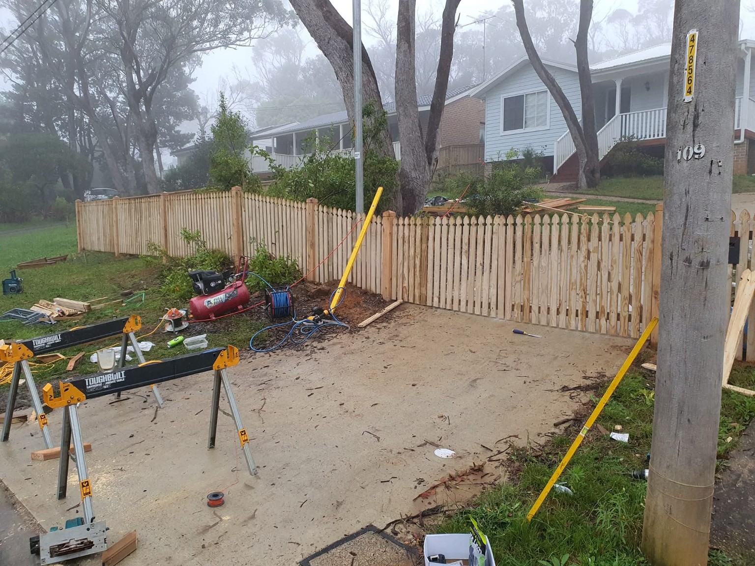 Timber picket fence installation